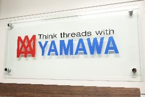 Yamawaka Manufacturing Company Signboard and Logo